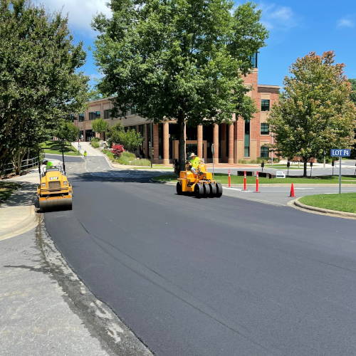 Small Road Project - Finishing with Rollers | SMI Paving Finishing paving with roller equipment